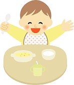 happy baby at mealtime